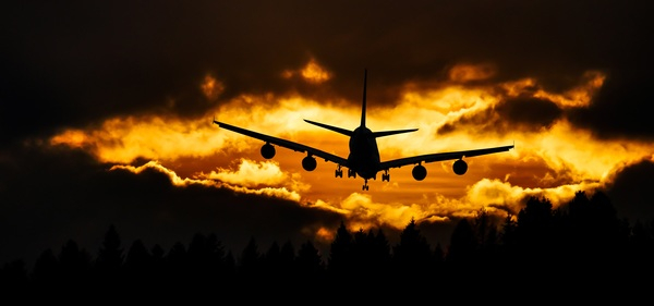 aeroplane,aircraft,airplane,aviation,clouds,dawn,dusk,flight,flying,landing gears,silhouette,sky,sunrise,sunset,travel,Free Stock Photo