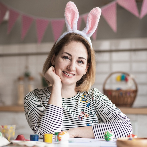 squared,bunny ears,ears,smiling,tradition,eggs,portrait,festive,christian,bunny,traditional,fun,easter,event,mother,cute,home,woman,family