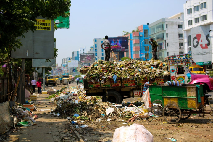 bangladesh,buildings,city,daylight,dirty,downtown,garbage,india,junk,litter,people,pollution,road,smelly,street,town,trash,truck,urban,waste