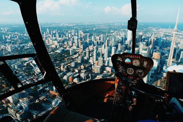 cityscape,skyline,tower,architecture,building,structure,city,skyscraper,aerial,view,helicopter,ride,trip,travel,rooftops,sky,clouds