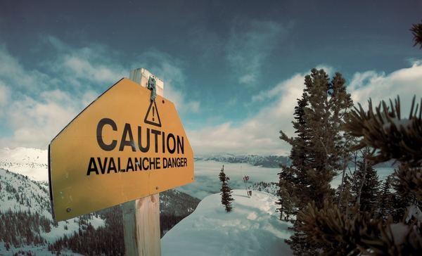 etc,sign,light,danger,sign,blue,sign,wall,building,sign,avalanche,caution,forest,snow,tree,danger,mountain,cloud,cloudy,yellow,blue