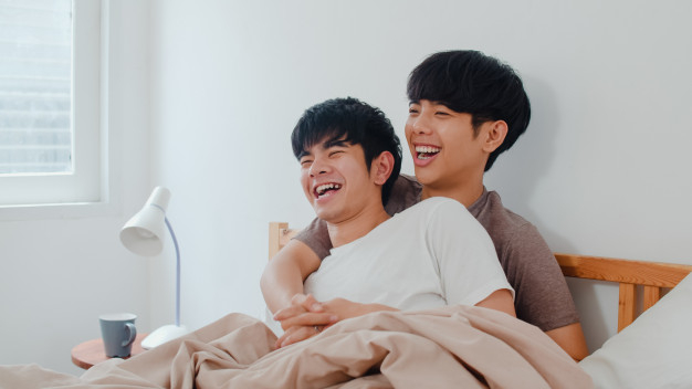 Handsome Asian Gay Couple Talking On Bed At Home Young Asian Lgbtq Guy Happy Relax Rest 