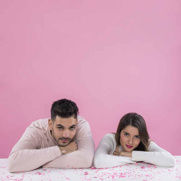 background,love,woman,light,camera,man,table,pink,anniversary,space,cute,valentine,white background,confetti,square,couple,white,pink background,sweet,studio,light background,cute background,love background,romantic,together,young,background pink,background white,beautiful,sitting,portrait,lifestyle,square background,beauty woman,love couple,relationship,adult,shot,pretty,smiling,copy,looking,two,girlfriend,handsome,casual,boyfriend,format,brunette,leaning,affection,tenderness,at,copy space,closeness,spangles,studio shot,elbows,looking at camera,square format