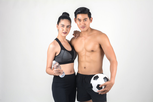 showing,muscular,attractive,isolated,sporty,abs,athletic,six,trainer,bodybuilder,adult,balls,male,pack,fit,activity,lifestyle,portrait,beautiful,healthy lifestyle,background white,strong,workout,young,female,weight,diet,training,exercise,healthy,body,white,couple,happy,white background,gym,health,fitness,sport,man,woman,background