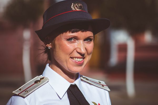woman,wear,veil,uniform,track,smiling,service,portrait,police,pilot,person,outfit,official,military,leader,girl,force,daylight,blur,beautiful,authority,adult