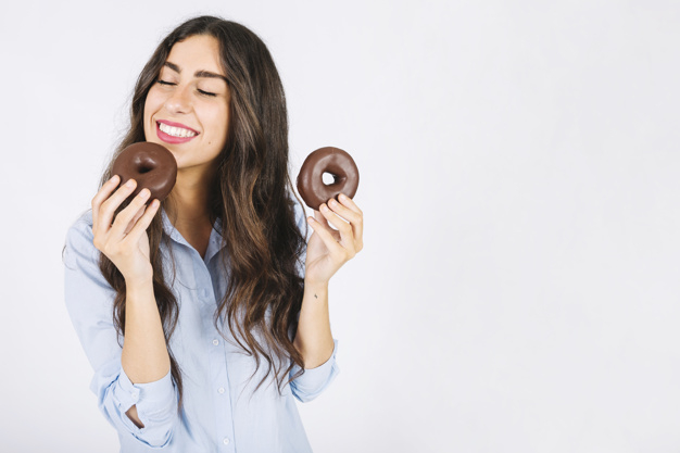 food,face,smile,sweet,eat,donut,female,young,good,donuts,delicious,smiling,looking,tasty,joyful,good looking,with