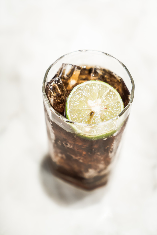 iced,caffeine,refreshing,macro,tall,cola,coke,beverage,cubes,soft,soft background,ice cube,soda,restaurant background,cool,summer background,diet,cold,frozen,brown background,brown,lemon,cube,drink,glass,ice,restaurant,summer,background