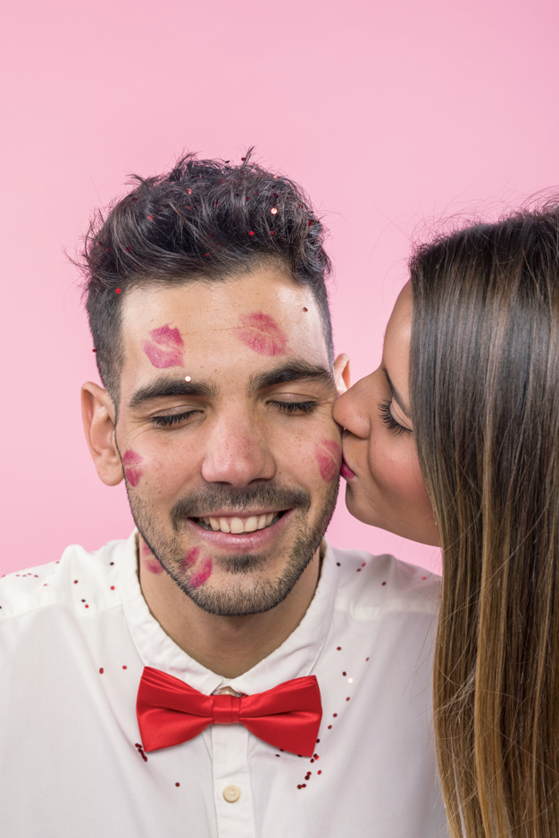 background,party,love,woman,man,pink,red,face,celebration,valentine,happy,bow,confetti,shirt,holiday,couple,white,pink background,happy holidays,fun,tie,studio,kiss,background red,lipstick,party background,love background,romantic,bow tie,together,woman face,young,background pink,celebration background,beautiful,portrait,beauty woman,love couple,lovers,relationship,kissing,adult,shot,smiling,two,girlfriend,handsome,casual,boyfriend,cheerful,marks,brunette,affection,cheek,enjoying,tenderness,spangles,studio shot,with