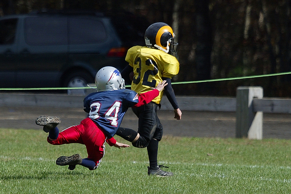 football,tackle,run,running,children,kids,kiddie,ball,game,fall,autumn,play,playing,field,sports,youth,yardline