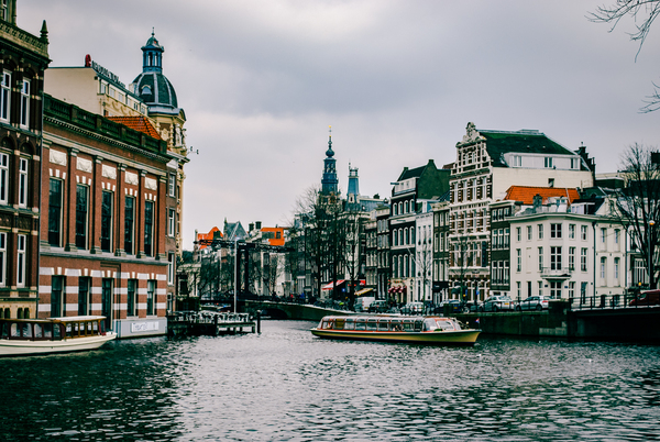 amsterdam,architecture,boat,buildings,canal,city,europe,river,urban,water,watercraft,waterfront,Free Stock Photo