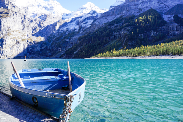boat,lake,mountain,row,blue,green,water,snow,mountain,alps,swiss,clear,grass