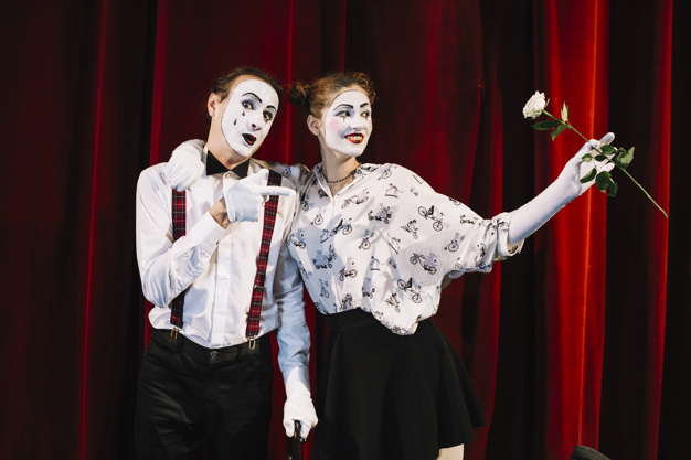 flower,people,man,character,paint,red,rose,face,art,circus,makeup,white,umbrella,curtain,theater,life,female,together,young,woman face