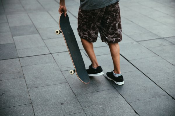 skate,skating,trainers,young man,skateboard, short shorts