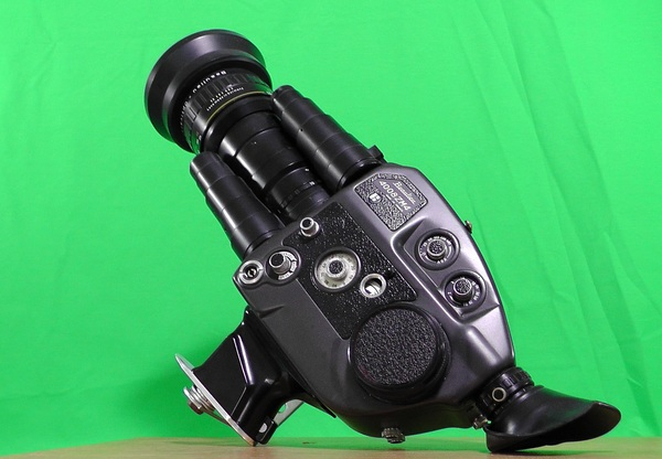 zoom,video recording,video,technology,studio,shooting,power,optics,objective,modern,lens,instrument,green background,filming,film,equipment,electronics,device,collection,classic,camera,aperture,antique