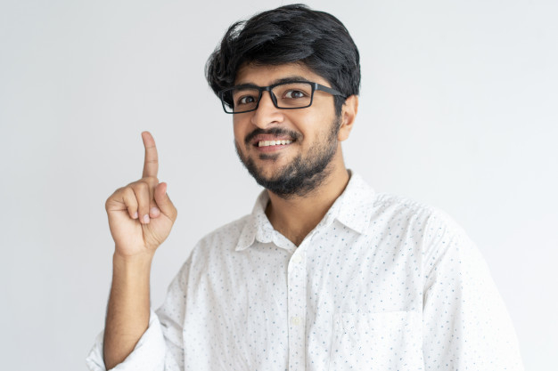 darkhaired,recommending,one,approving,upwards,representative,showing,bearded,casual,handsome,front,standing,looking,pointing,smiling,horizontal,adult,guy,gesture,male,positive,up,portrait,attention,content,manager,young,warning,studio,customer,finger,product,worker,indian,businessman,person,glasses,shirt,promotion,happy,idea,student,man,camera,business