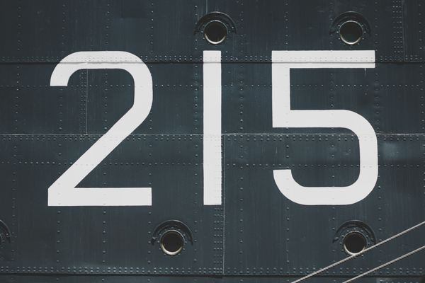 lav,light,city,typography,sign,light,number,texture,rust,number,ship,sign,two hundred and fifteen,navy,typography,iron