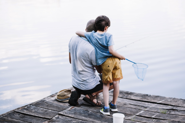 people,water,wood,man,nature,sport,fish,kid,child,person,boy,hat,children day,fishing,father,fathers day,river