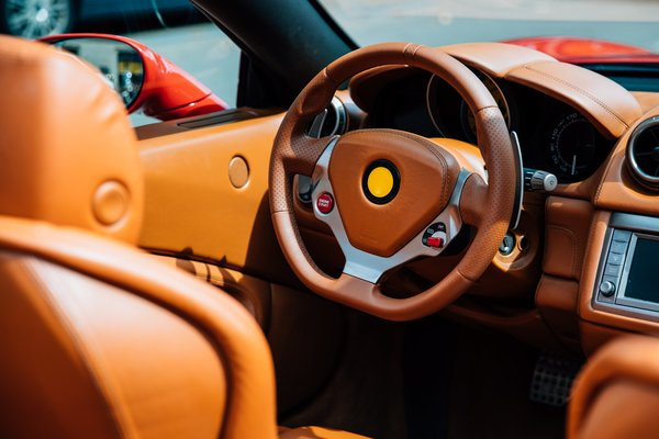  car,brown,ferrari,luxury car,convertible, stitched leather