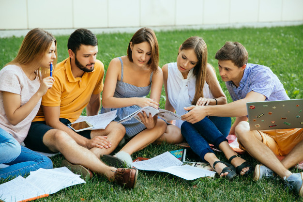 people,summer,education,green,grass,books,laptop,smile,study,note,friends,communication,university,students,men,help,fun,group,show,college