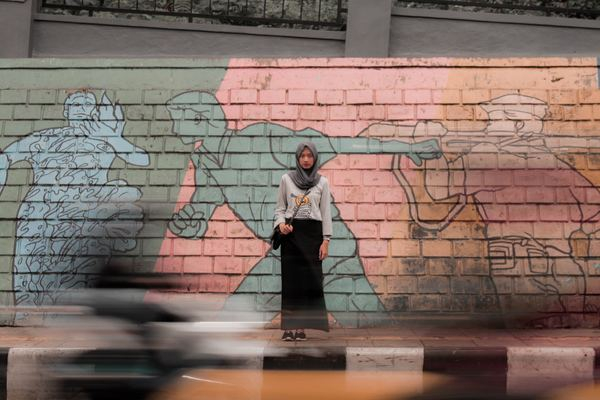 hijabi,woman,female,girl,woman,female,woman,girl,female,person,urban,wall,brick,grafitti,mural,standing,sidewalk,female,lady,woman,motion blur,png images