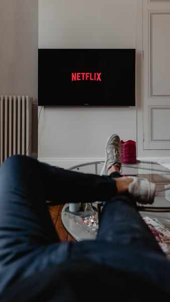 person,hand,man,cinezine,movie,light,autumn,fall,leafe,leg,shoe,table,candle,tv,television,netflix,apartment,person,home,watching,relax,free images