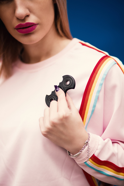 batman,blonde,blue background,face,fashion,female,fidget spinner,girl,hair,hand,indoors,lady,lips,model,people,person,photoshoot,pink,pose,skin,studio,style,toy,wear,woman,young,Free Stock Photo
