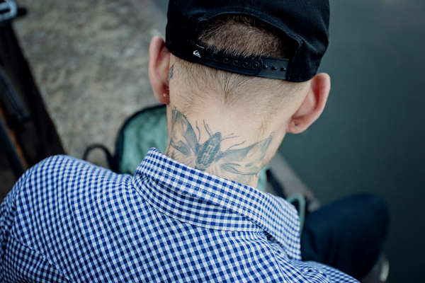 adult,guy,hat,male,man,neck,person,tattoo