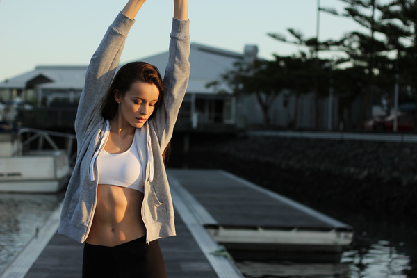 girl,woman,yoga,stretch,pose,health,fitness,exercise,working out,beauty,people,brunette,hoodie