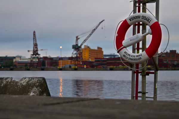 accidents,aid,background,belt,blurred,boats,buoy,canal,city,clouds,composition,concept,drowning,drunk,emergency,focus,foreground,gothenburg,harbour,help,industry,ladder,life,lifesave,lights,morning,night,ocean,outdoor,people,red,reflection,rescue,ring,rope,safety,save,sky,sunrise,survive,sweden,swedish,unfocused,water,white