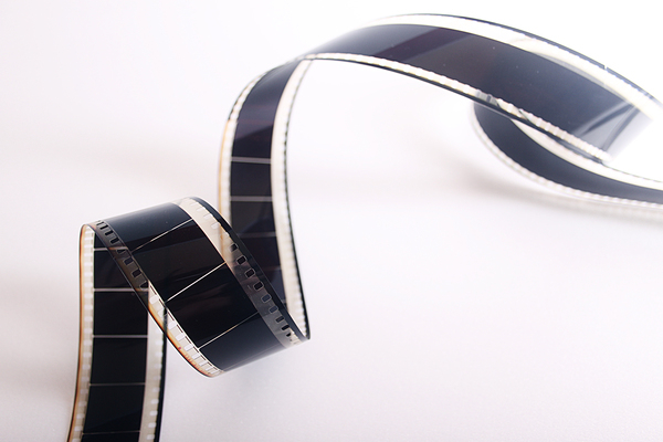 cinema,cinematography,curve,entertainment,film,filmstrip,movie,negative,old,photography,picture,reel,screen,studio,tape,vintage,Free Stock Photo