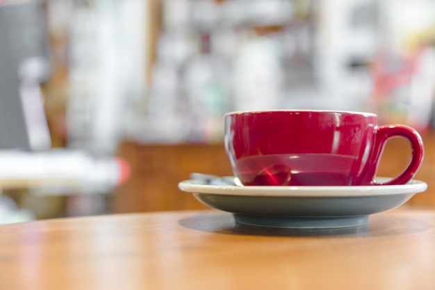 coffee,wood,table,red,tea,cafe,colorful,coffee cup,drink,desk,cup,breakfast,plate,mug,wooden,morning,wood table,tea cup,bright,up