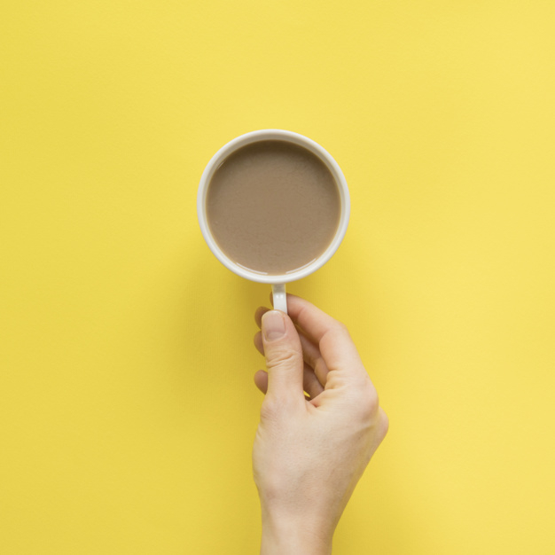background,food,coffee,people,hand,table,space,tea,cafe,human,yellow,backdrop,person,yellow background,colorful background,coffee cup,drink,cup,breakfast,food background,finger,brown,studio,brown background,skin,morning,hot,dish,simple,fresh,liquid,background food,strong,background yellow,holding hands,background color,bright,up,coffee background,top,close,beverage,delicious,holding,espresso,copy,cappuccino,aroma,colored,high,utensil,simplicity,refreshment,caffeine,aromatic,closeup,overhead,elevated