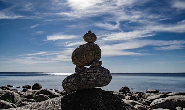 balancing,ocean,outdoors,rock balancing,rocks,sea,seashore,sky,stones,water