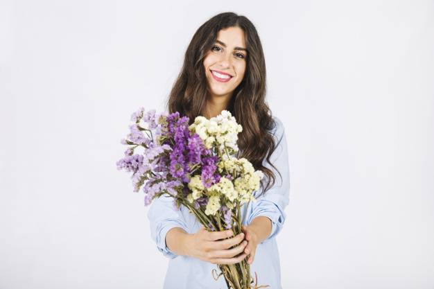 flowers,face,smile,female,bouquet,young,good,beautiful,holding,smiling,looking,wildflowers,joyful,good looking,of
