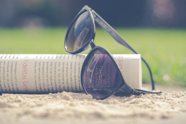 sunglasses,magazine,beach,travel,vacation,holiday,grass,read