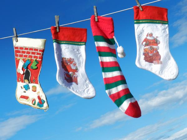 stocking,stockings,clothesline,line,sky,red,green,white,holiday,christmas,xmas,merry,happy,santa,claus,decoration,decor,object,objects