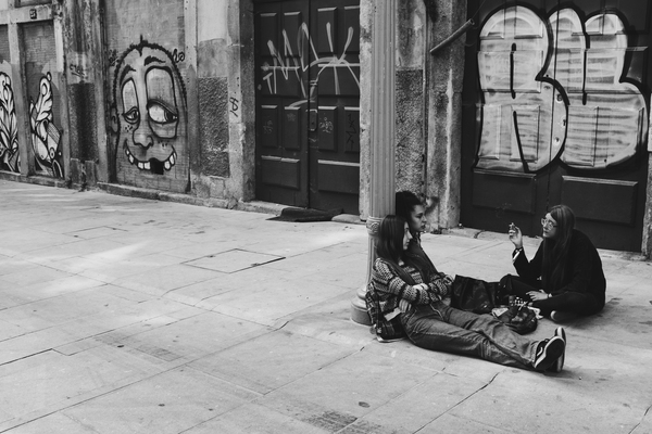 black and white,black-and-white,graffiti,group,pavement,people,street,women