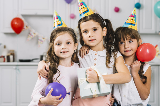 birthday,people,party,house,gift,kitchen,home,cute,celebration,smile,kid,colorful,balloon,event,child,decoration,hat,balloons,decorative,group