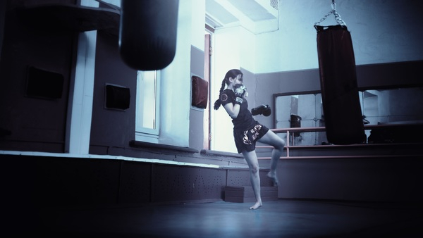 girl,kickboxing,mma,muay thai,gym,punching bag,fitness,exercise,working out,boxing gloves,people,strength,training,athlete