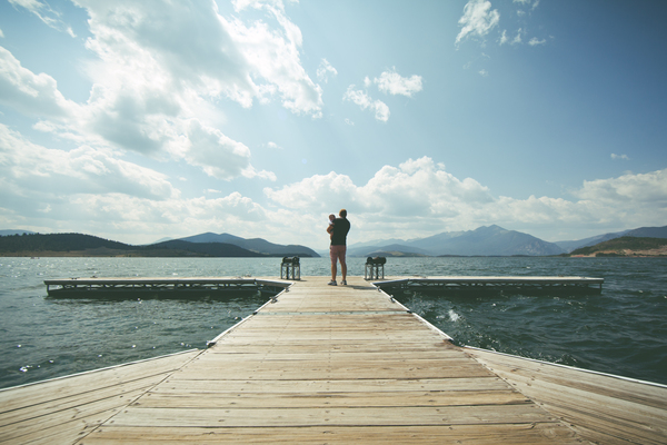 child,clouds,dad,dock,father,lake,mountain range,mountains,nature,outdoors,parent,pier,relaxation,sky,water,Free Stock Photo