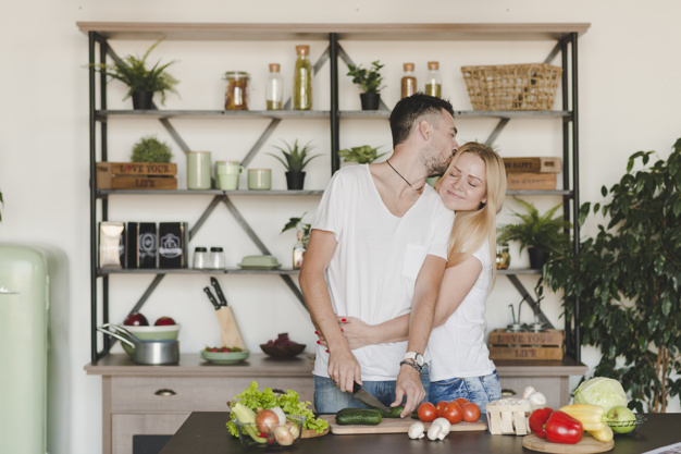 food,people,house,hand,man,kitchen,hair,home,smile,happy,couple,board,plant,organic,help,stand,tomato,romantic,female,knife
