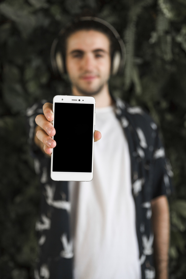 poster,template,man,leaves,smartphone,person,poster template,boy,tech,plants,headphones,blur,screen,device,guy,blurred,outdoors,vegetation