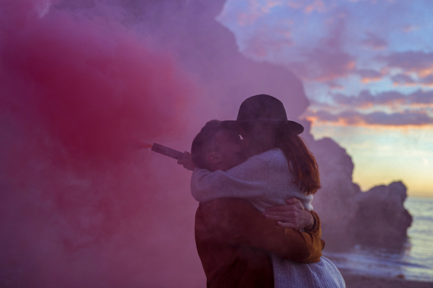 water,love,man,nature,blue,beach,sea,sky,pink,color,smoke,couple,hat,water color,ocean,night sky,romantic,together,young,jacket