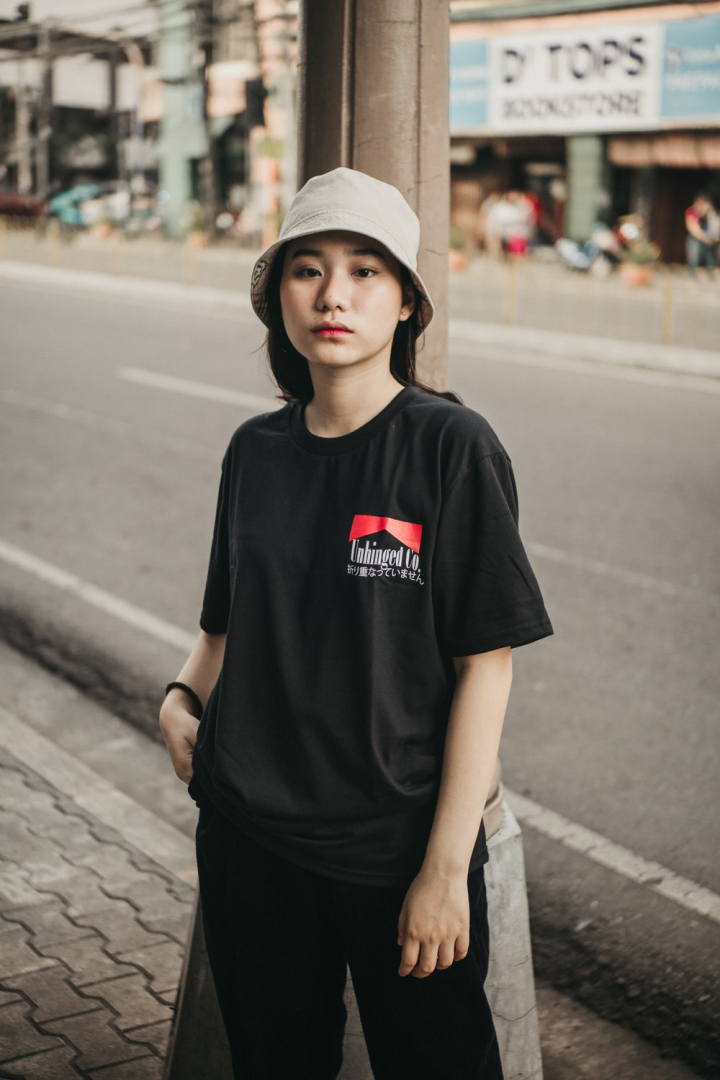 Free: Photo of Woman Wearing Bucket Hat and Black Shirt - nohat.cc