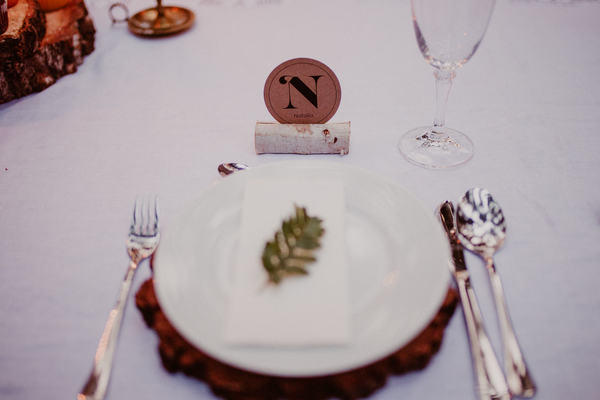 events,venue,banquet,hall,wedding,party,plate,spread,styling,cutlery,utensils,fern,leaves,monogram,glass,still,bokeh