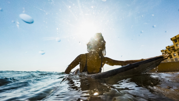 travel,water,house,summer,building,woman,light,wave,nature,sport,blue,sea,sky,holiday,water drop,body,ocean,drop,healthy,vacation,swimming,lady,female,young,healthy lifestyle,beautiful,lifestyle,blue sky,beauty woman,fit,motion,surfboard,movement,sunny,hobby,slim,adult,horizontal,active,pretty,anonymous,extreme,outdoors,leisure,wet,lying,faceless,backlit,unrecognizable