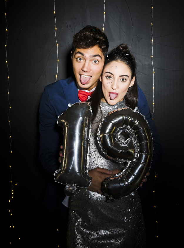 party,love,camera,man,celebration,black,number,wall,balloon,event,couple,silver,makeup,numbers,lights,dress,balloons,fairy,celebrate