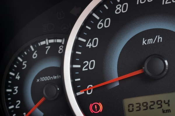 speedo,speedometer,rev,counter,odometer,speed,start,stop,engine,car,button,dashboard,modern,new,drive,auto,automobile,interior,black,sleek,design,go,journey,driving,nobody,isolated,dial,circle,round,technology,gadget,electronic,detail,closeup