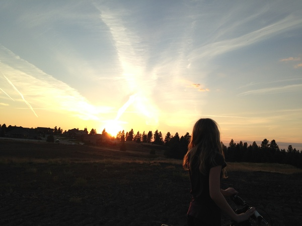 sunset,girl,woman,bike,bicycle,dusk,sky,trees,fields,rural,long hair