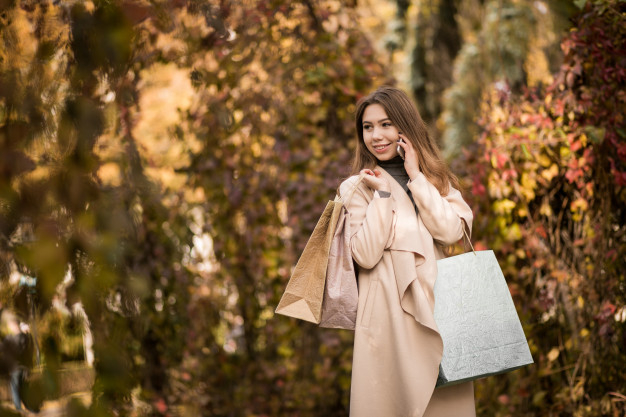 caucasian,using,wearing,charming,posing,attractive,outside,casual,outdoors,looking,smiling,pretty,laughing,adult,joy,hair style,young people,coat,woman hair,lifestyle,fashion model,style,portrait,beautiful,autumn background,background white,smart,young,cellphone,female,bags,fashion girl,model,fun,nature background,mobile phone,thinking,dress,park,street,success,fall,yellow,white,technology background,happy,mobile,autumn,shopping,beauty,hair,girl,nature,phone,fashion,woman,technology,people,business,background